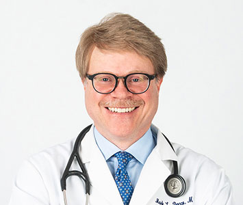 Dr. Mark L. Decco